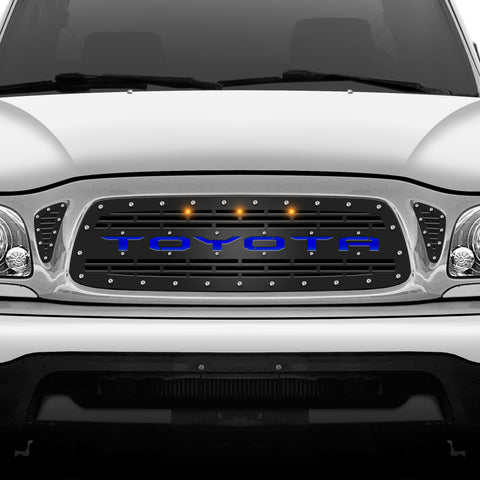1 Piece Steel Grille for Toyota Tacoma 2001-2004 - TOYOTA w/ BLUE ACRYLIC UNDERLAY + 3 AMBER RAPTOR LIGHTS