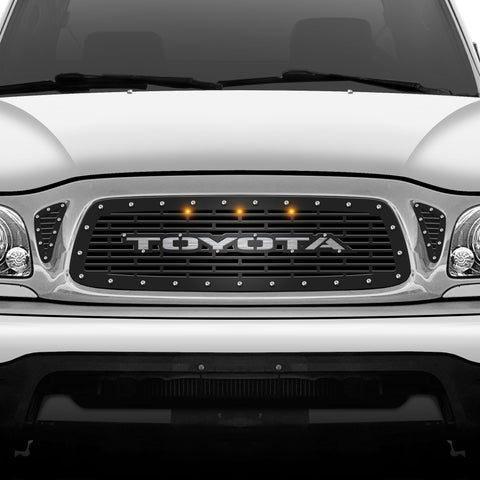 1 Piece Steel Grille for Toyota Tacoma 2001-2004 - TOYOTA w/ 3 STAINLESS STEEL UNDERLAY + 3 AMBER RAPTOR LIGHTS